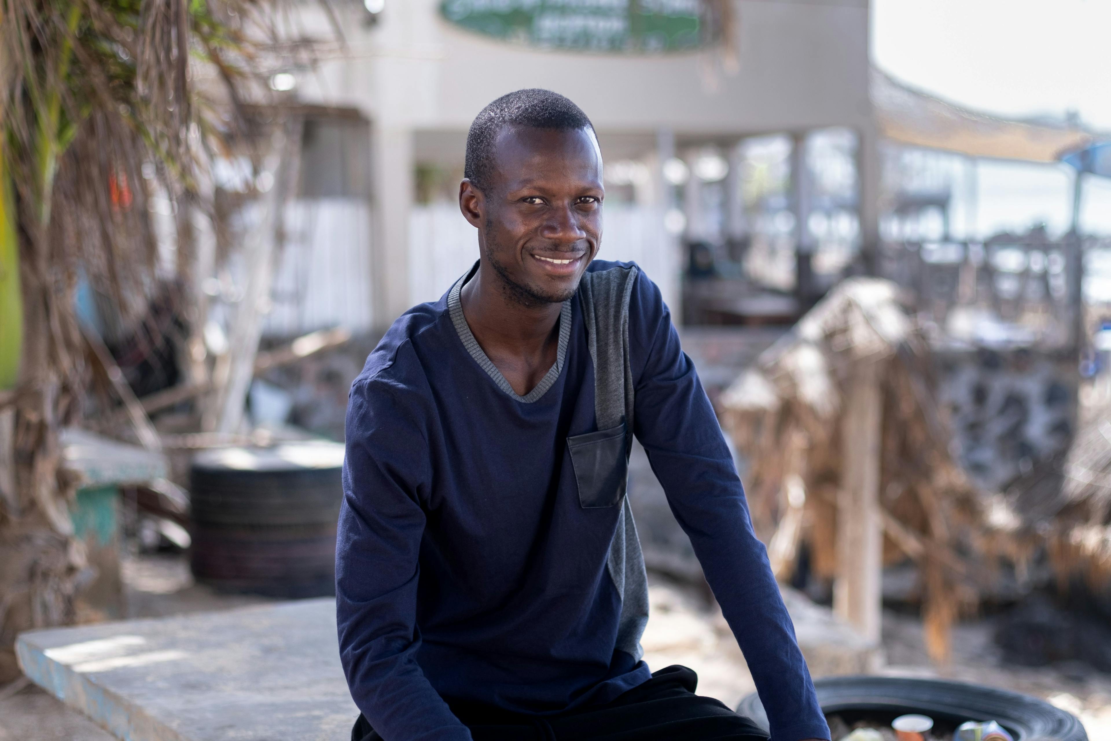 Mohamed Jobarteh (24), barber shop trainee 