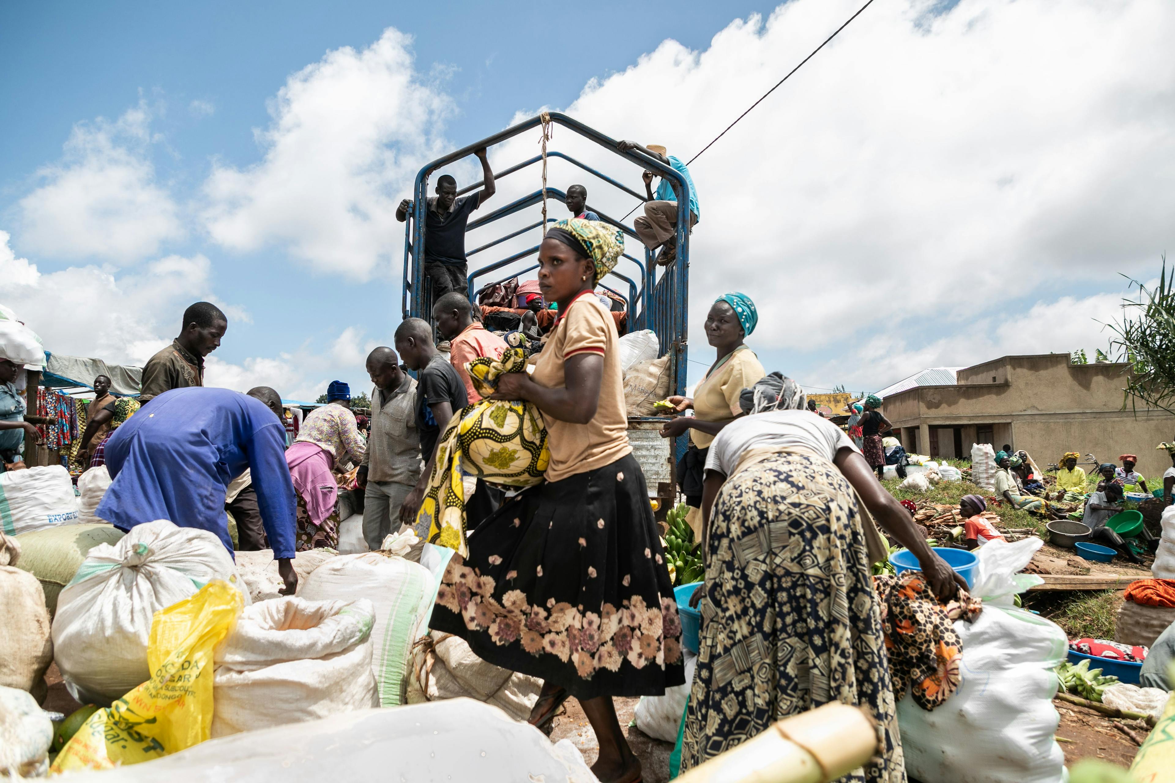 Borderlands typically have strong trade and travel ties. Women traders are at the heart of a vibrant supply chain that feeds local markets. They buy fresh produce such as rice, bananas, and ground nuts imported from the DRC to sell in Arua.